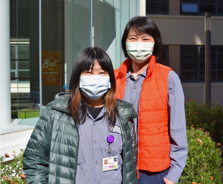 UCSF custodians Eva Banh and Michelle Mo in School of Nursing Plaza.